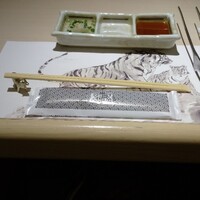 牛刺しと焼肉 仔虎 クリスロード店 - 虎のランチョンマット
