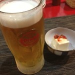 沖縄食材酒家 なかや - オリオン発泡酒だけど200円と良心的お値段。