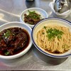 Lee's Dumpings 小李汤包 - 料理写真:“Sweet and Sour Pork Spare Ribs Noodle” ($18), “Braised Duck Tongue” ($10)