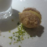 OSTERIA AL CORALLO - 香ばしいココナツメレンゲに、まったりオレンジバタークリーム