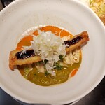 ワタリガラス - タンタンメン。麺と野菜の上に穴子天ぷらが1本乗ります。