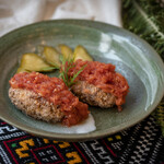 ウクライナカフェ・クラヤヌィ - グレチアヌィキ　トマトソース添え（そばの実ハンバーグ）