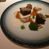 レ セゾン - 牛イチボ肉のポワレにハーブバターを添えて トリュフ風味のドフィーヌ