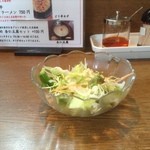 杏亭 - 　酸いドレッシングのおまけのサラダ