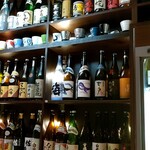 博多もつ鍋 いっとく家 - ズラリと焼酎が並んでます。さすが九州!!