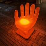 Bar&Co., - 店の前にある手の椅子（目印）