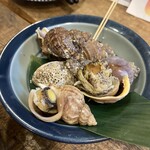 区民酒場 左利き - 磯つぶ貝の塩茹で748円