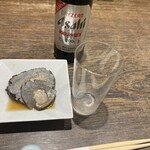 泊舟 - ノンアルコールビール６００円、お通し４００円。お通しは大浦ごぼう。射込んであります。