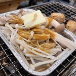 磯丸水産 - イカとキノコのワタ焼き