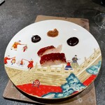 仁修樓 - ④ 脆皮烤乳豬　
      　子豚の丸焼き（りんご、黒酢味噌）