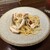 TOVILA osteria - 料理写真:本日の魚介スパゲッティにんにくオイル(ハーフ)。この日はあさりといかがゴロゴロ入ってます。レギュラー(100g)とハーフ(60g)が選べます。唐辛子を入れるかどうかも選択できるようです。