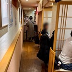 のどぐろ日本海 - 1階 半個室のテーブル席