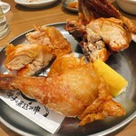 餃子のネオ大衆酒場 ニューカムラ - 四日仕込み一夜干しひな鶏の半身揚げ