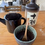 大師茶屋 - 蕎麦焼酎のボトルを蕎麦湯で