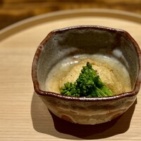 温石 - ２品目のおでん/ 唐墨入り餅巾着・菜の花・黒七味。ほろ苦い菜の花が春の訪れを感じます。