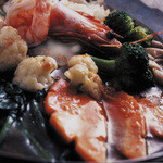 Rice noodles with Seafood and seasonal vegetables