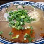 蘭州拉麺店 火焔山 - 提供時の表情。