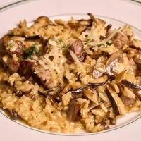 熟成肉とマッシュルームのパルメザンリゾット