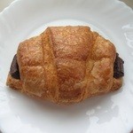 ホーミイベーカリー - チョコクロワッサン。ビターなチョコが大人の味。