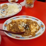 ネオ町中華へそ 新橋SL広場前店 - 痺れ麻婆豆腐　ホアジャオがかかってて香りも良かった　ジャストサイズ（小さめ）