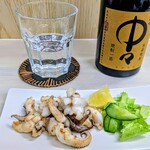 tell me キッチン - 紋甲イカのゲソバター炒め　宮崎県麦焼酎『中々』お湯割り