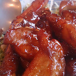 菜の花  - 骨付き豚ロース肉の甘酢炒め