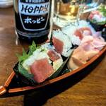 居酒屋くろ兵衛 - 船盛りの鉄火巻