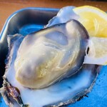 島田水産 - 焼きたての牡蠣