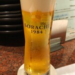 ビストロ シン モモタロウ - ビストロ シン モモタロウ　「SORACHI 生ビール」715円✕２で乾杯