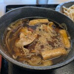 こんこ屋 - 中盤は七味唐辛子と摺り白胡麻を振って味変を楽しむ