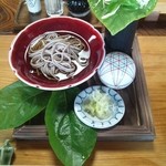 田舎料理おかりば - 花の器の中にとろろが入っています。