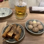 居酒屋燃えた うらめし屋 - 黒胡椒メンマとどんぐり（ウズラの味玉）