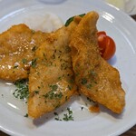 キッチン ブルー グローブ - 反対側から、透明な蜂蜜とレモンとパセリのソース