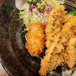 酒肴 新屋敷 - 俵型が佐助豚の焼きメンチ
