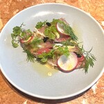 Carbo - なにかの鮮魚のカルパッチョ♩いちいちオシャレだな♩