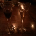 トラットリア・ピッツェリア・レ・アルカーテ - チョコレートのリキュール（左）とグラッパ（右）