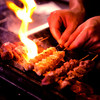 炭火焼鳥 たまどん - 料理写真:備長炭で焼き上げる
