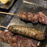 西海酒場斗々 - 紫蘇ウインナーと何だったかな。とにかく美味しい。