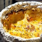 Grilled tomatoes and cheese in foil