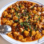 中華料理 味源 - 料理写真:本格派 四川麻婆豆腐 —— 痺れる山椒とコク深いバターの絶妙なハーモニー 
四川の味を追求し、山椒の爽やかな痺れとバターのまろやかなコクを加えた、特別な麻婆豆腐。  
本場の辛さと香りが際立つ、まさに本物の中国式麻辣豆腐。  
濃厚で奥深い味わいがクセになる一品を、ぜひご堪能ください！