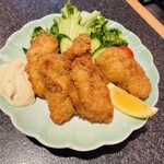 丸長寿司 - 巨大な笑笑牡蠣フライ