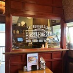 BOSSA BURGER - 内観２：お店ロゴ入りミラー