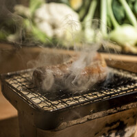 肉汁ソーセージの藁焼き