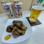 tell me キッチン - オリオン缶ビール　ラフテーとソーキの煮込み盛り合わせ