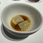 レフェルヴェソンス - 鴨腿肉のラビオリ ほしこがね コンソメ