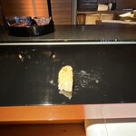 乙女寿司 - ヤリイカ。上の胡麻が良いアクセントで身も柔らかい！