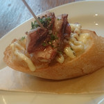 ドノスティア - ジューシーな飴色玉葱！小イカと玉葱のピンチョス300円