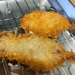 ジャンボ釣船 つり吉 - 明太子串(奥)とホルモン串(手前)