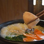 h Shin kei - 神鶏の看板料理【本場博多の水炊き】