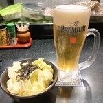 三酉屋 - 生中572円、お通し330円